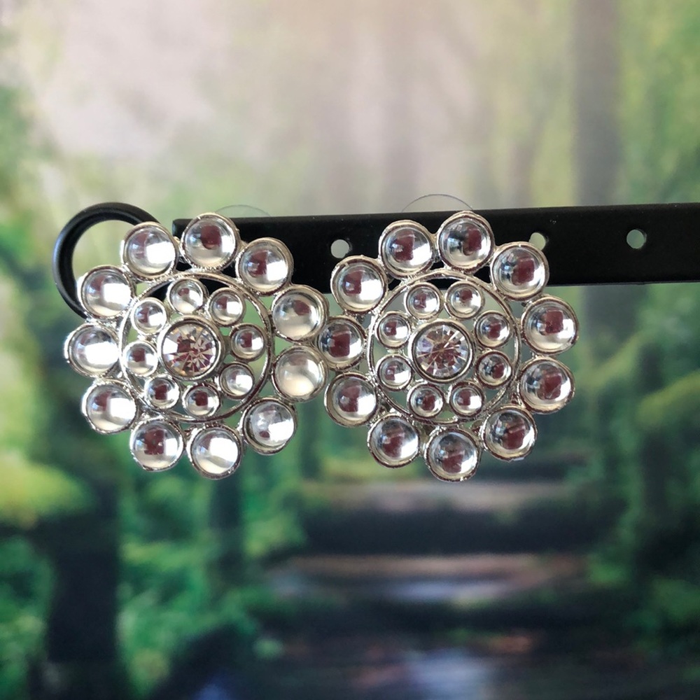 Large flower shaped silver studs